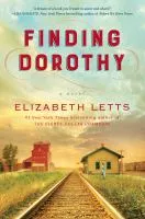 Book cover for "Finding Dorothy" by Elizabeth Letts, featuring a train track leading to a small town with a red building and