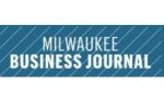 Milwaukee Business Journal logo on a blue banner with diagonal lines.